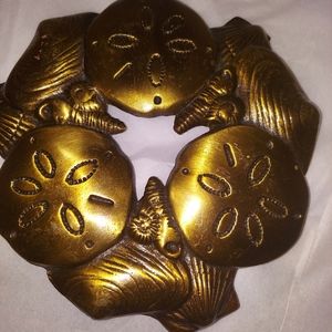 Coastal Grandma kitchen trivet. Beach . Shells. Artist signed. Brass.